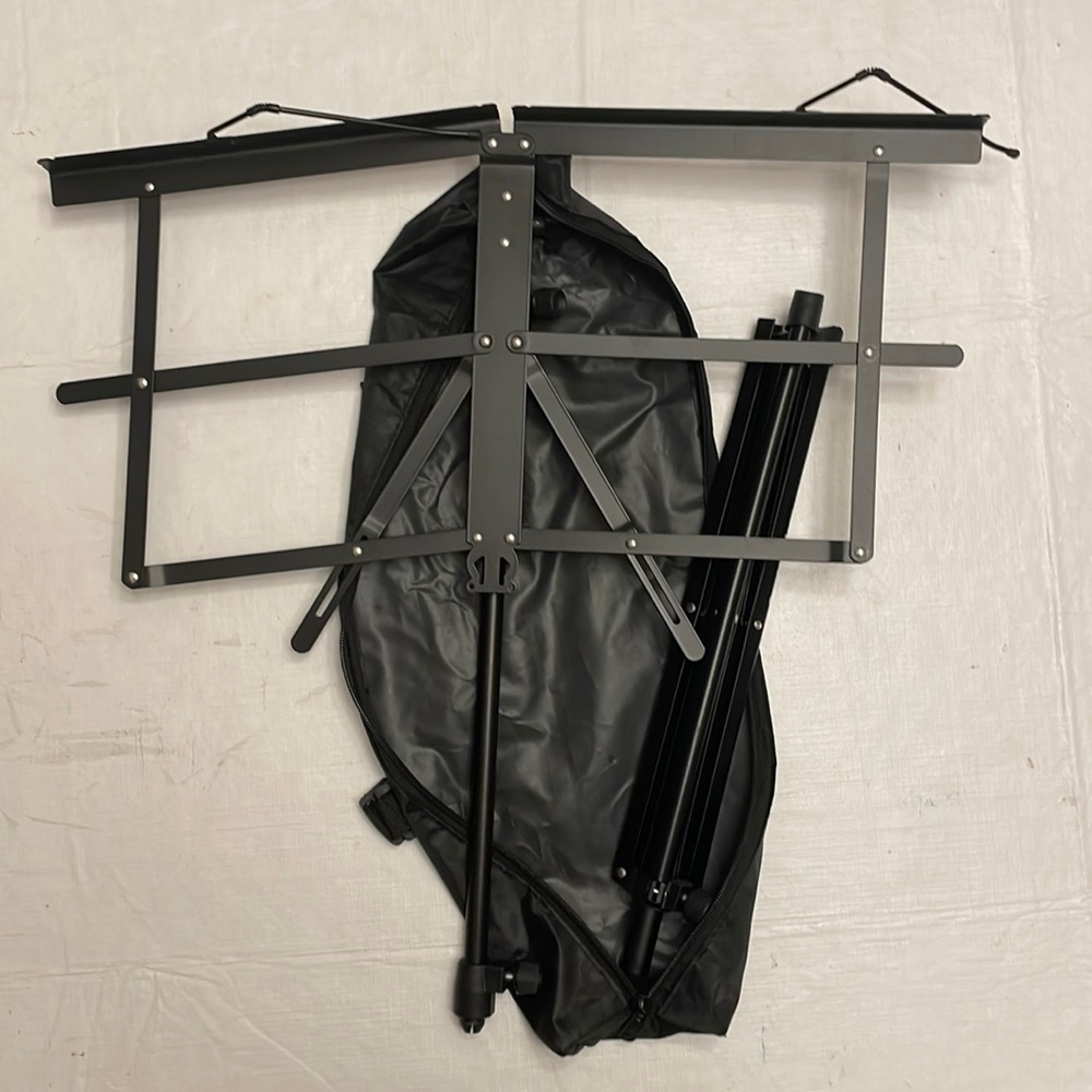 Adjustable, fold down and portable music stand